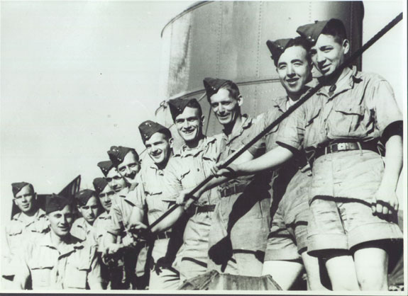 Canadians en route to Hong Kong aboard HMCS Prince Robert. Note the smiles.