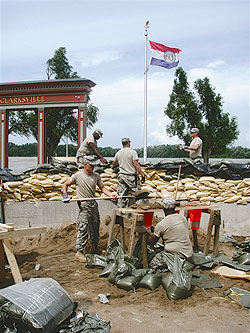 US National Guardsmen sandbagging in preparation for flood waters
