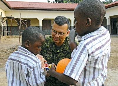 Soldier with children in Africa