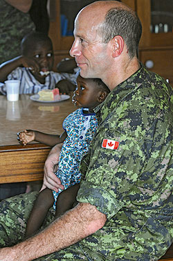 Soldier with child in Africa