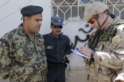 CIMIC team member and Afghan National Police