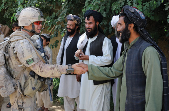 A Commander introduces himself to men from a local village in Panjwa'i Dist
