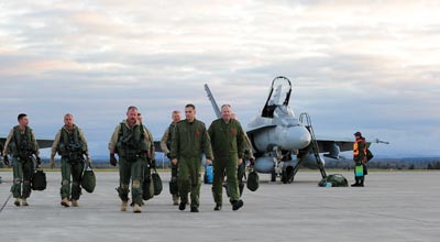 Seven CF-18 Hornets from 425 Tactical Fighter Squadron return to their home base