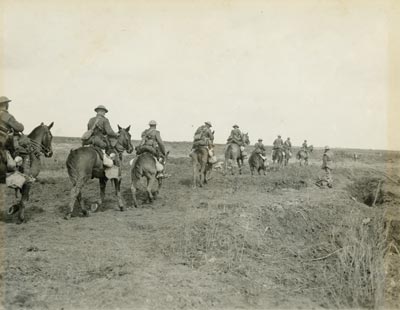 Troops of the Canadian Light Horse advancing from Vimy Ridge, 9 April 1917.