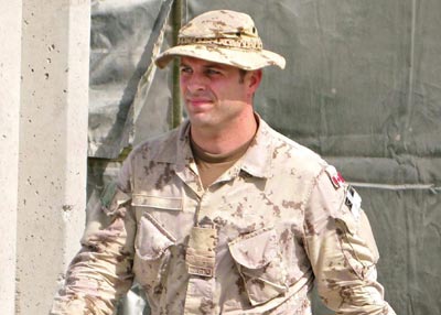 Captain Robert Semrau leaves a military courtroom at Kandahar airfield, Afghanistan, 26 June 2010.