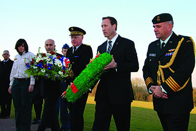 Attachés are often called upon to take part in ceremonial events.  Here, former defence attaché to France, Colonel Christian Rousseau, with Minister of National Defence Peter MacKay, lay a wreath at Vimy Ridge.