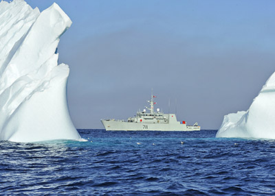 HMCS Summerside sails past an iceberg in the Davis Strait during Operation Nanook 2011.
