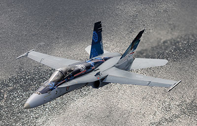 Canada’s 2012 Demonstration Hornet soars over the Strait of Georgia and Vancouver Island’s coastline, 4 May 2012.