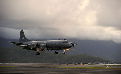 A Royal Canadian Air Force CP-140 Aurora aircraft from 14 Wing Greenwood, Nova Scotia, lands at Marine Corps Base Hawaii, Kaneohe Bay, Hawaii, 23 July 2012.
