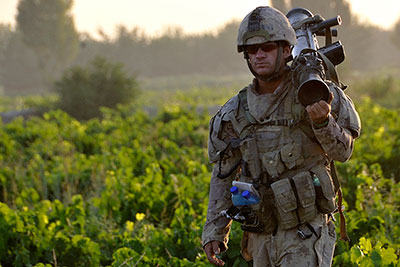 Corporal Jean Francois Belzil, a member of “Lucky 13” Platoon, A-Company, 1st Battalion, Royal 22e Régiment provides security during Operation OMID ATAL 09 (Hope and Victory). 