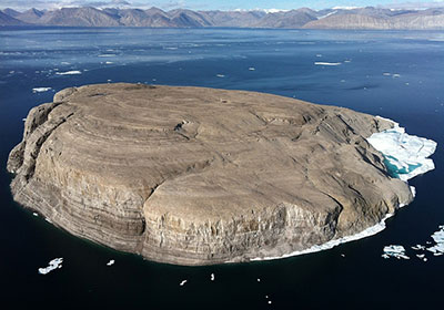 Hans Island as seen from the air, with Ellesmere Island in the background.