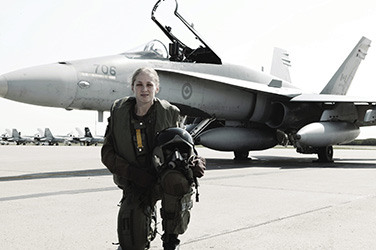 female CF-18 pilot in front of aircraft