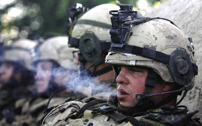 Tired Canadian soldiers take a smoke break, 3 July 2007.