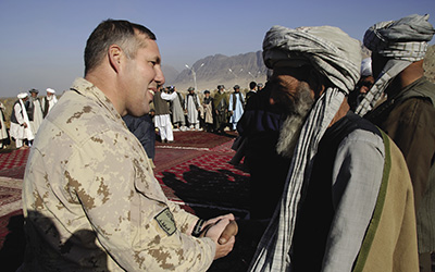 Soldier with Afghan tribal leader