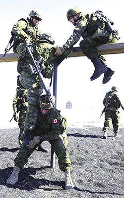 Members of 1 CMBG on obstacle course at Edmonton Garrison
